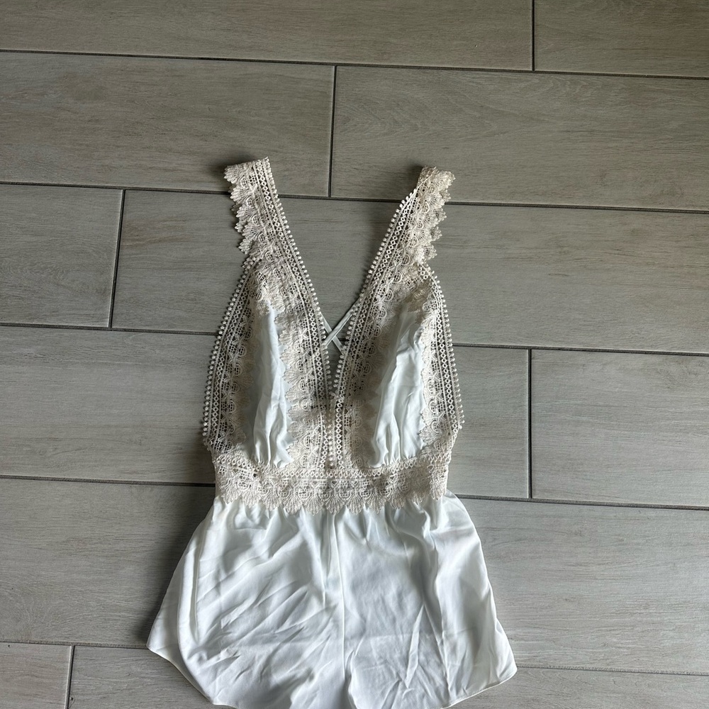 Elegant White Lace Bodysuit